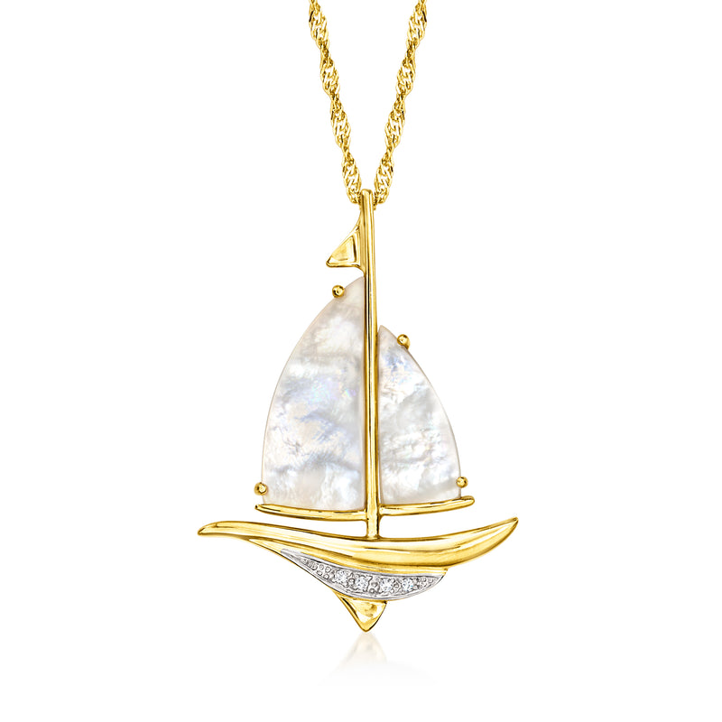 Gold sailboat pendant necklace with mother-of-pearl sails and diamond accents