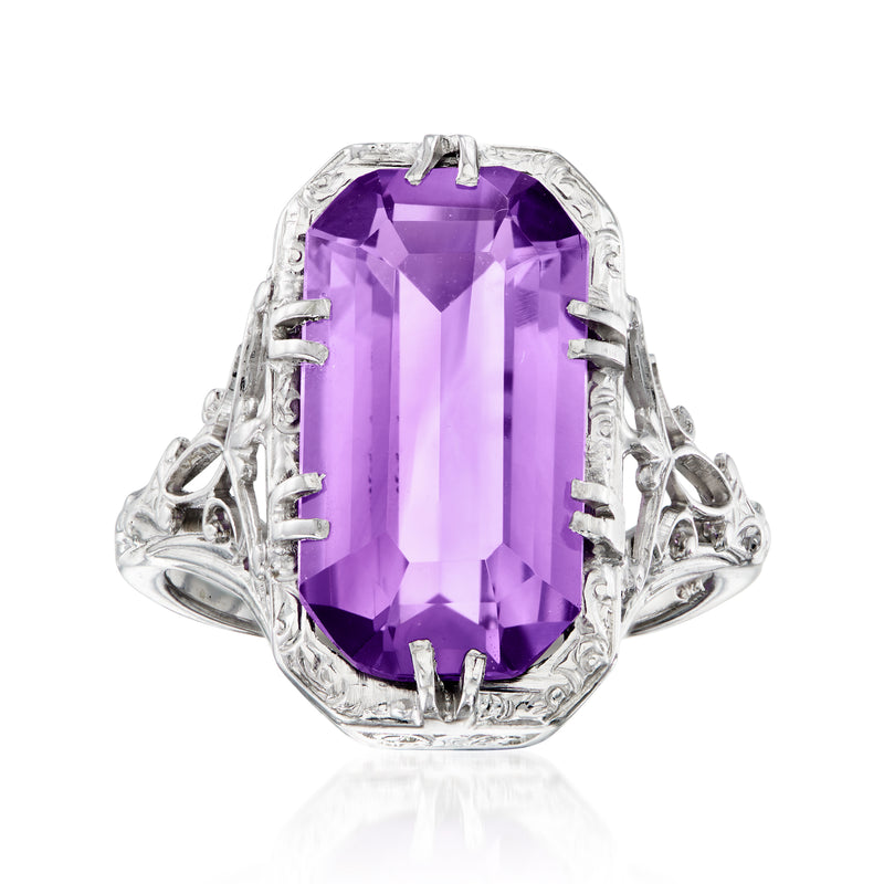 Amethyst filigree ring with oval purple gemstone in white gold setting