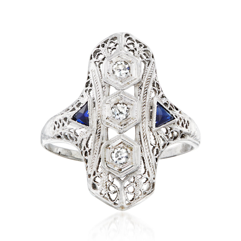 14kt white gold filigree ring with blue synthetic sapphires and diamond accents