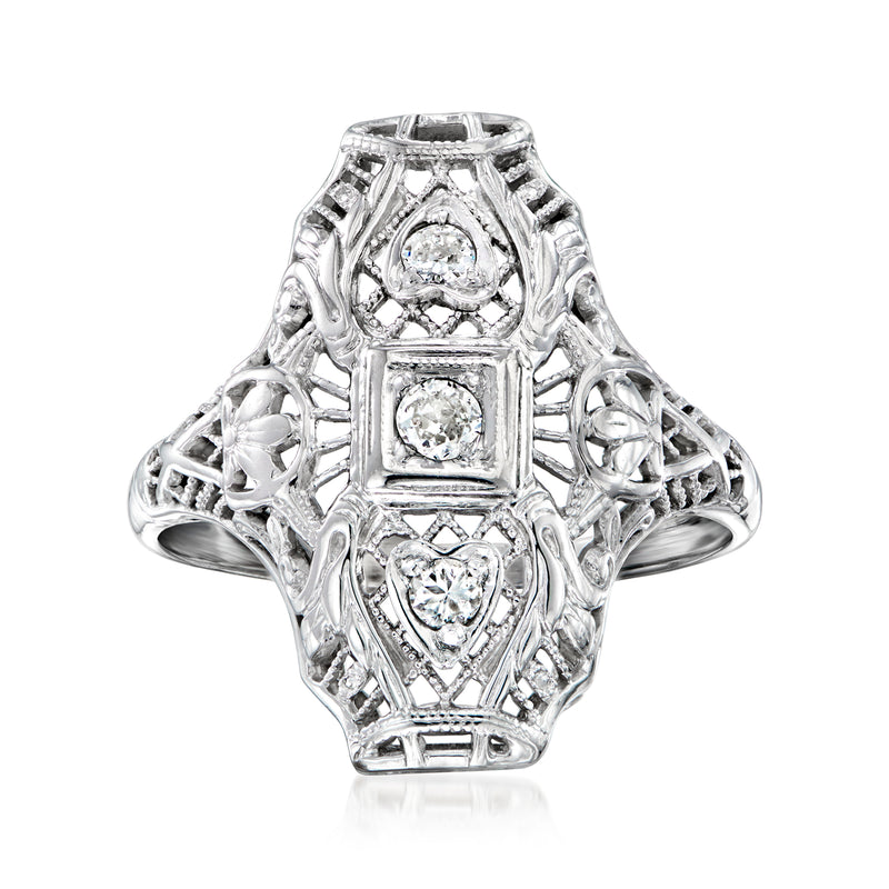 Vintage white gold heart filigree ring with three round diamonds, scalloped bezel