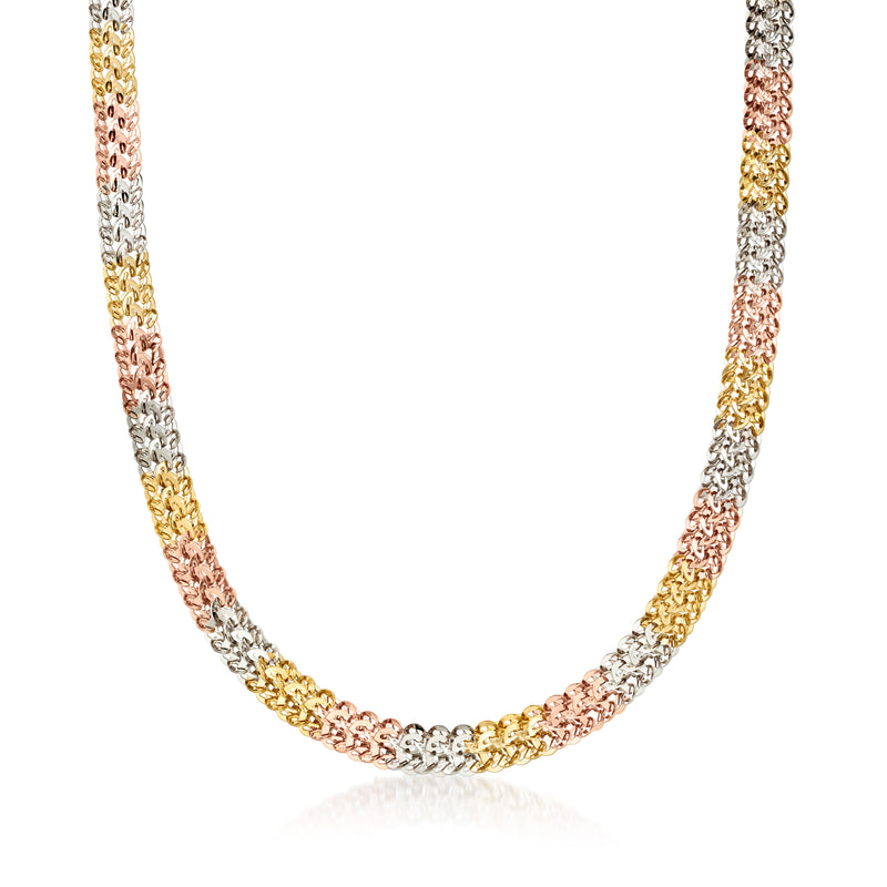 Tri-colored 14kt gold fancy-link necklace with curving chain links, polished shine