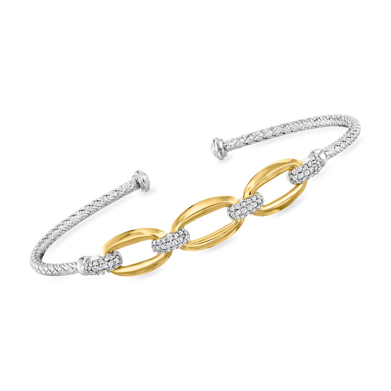 Silver cuff bracelet with gold-tone oval links and oval CZ stones.
