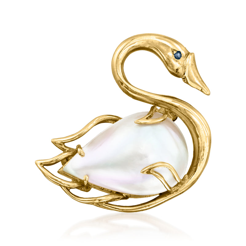 Gold swan pin with cultured pearl body and small blue sapphire accent