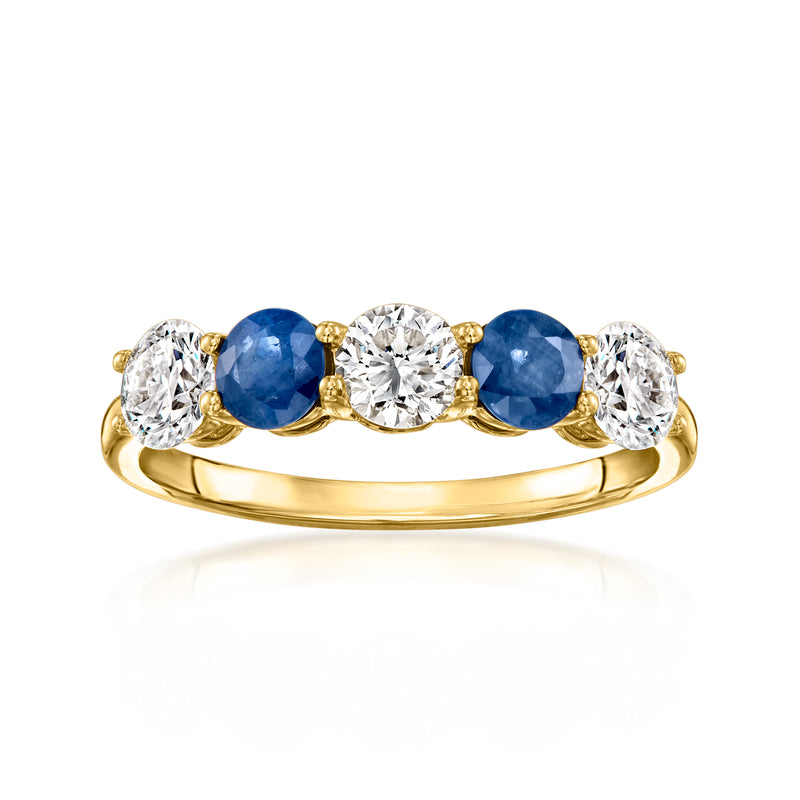 14kt yellow gold ring with oval blue sapphire and round diamond accents