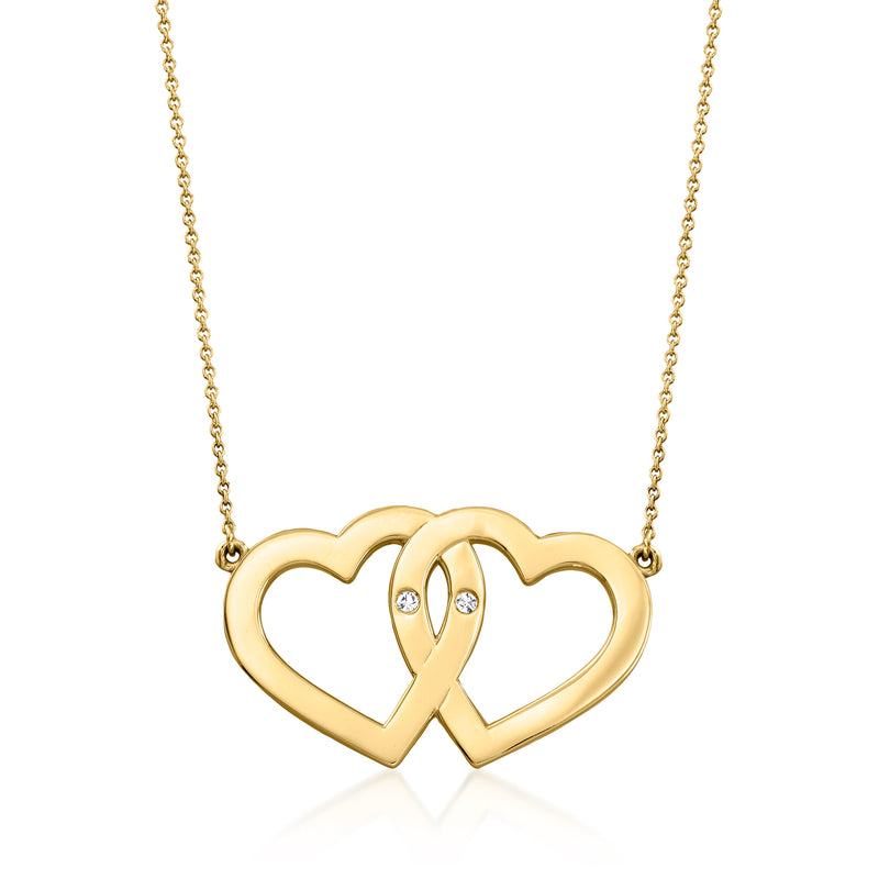 14kt yellow gold two-heart necklace with diamond-accent bow pendant
