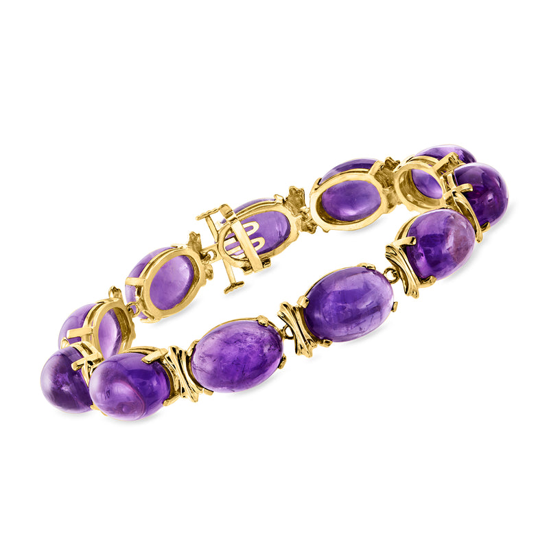 Vintage amethyst link bracelet in 14kt yellow gold with oval purple gemstones