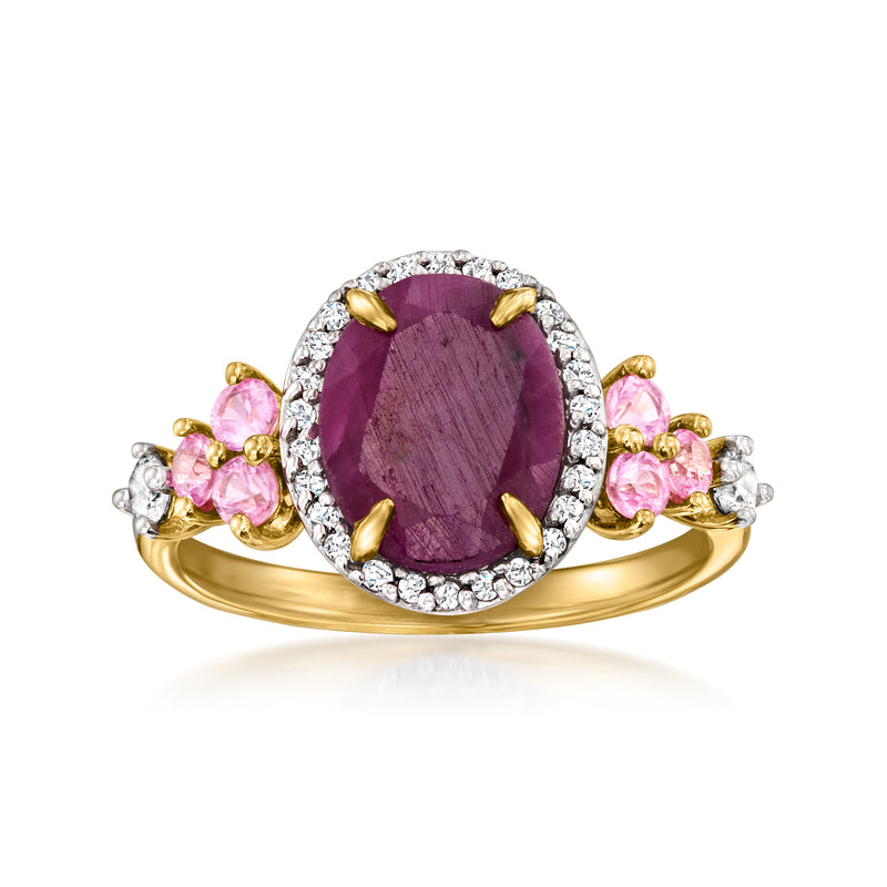 Oval dark ruby gemstone ring with diamond halo, pink sapphire clusters, gold setting