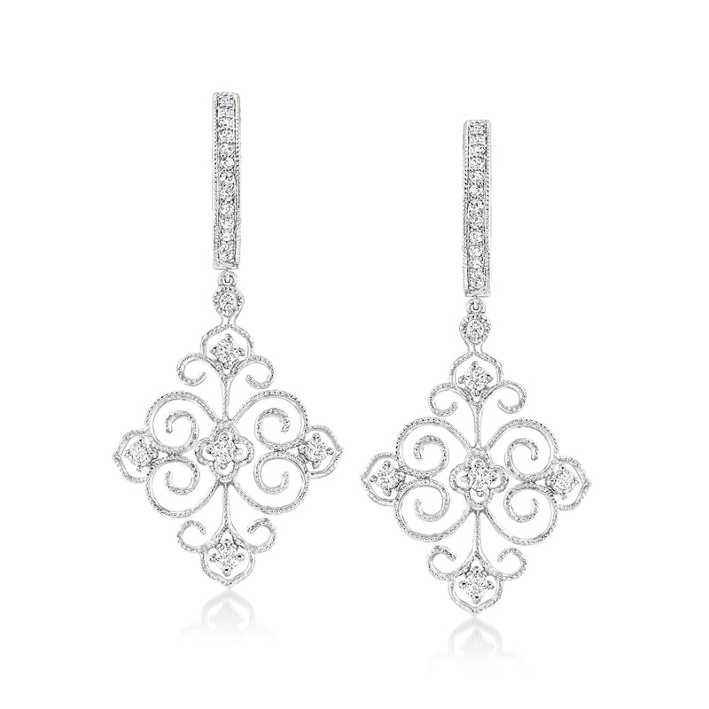 Sterling silver filigree hoop drop earrings with diamond accents and ornate floral cross charm