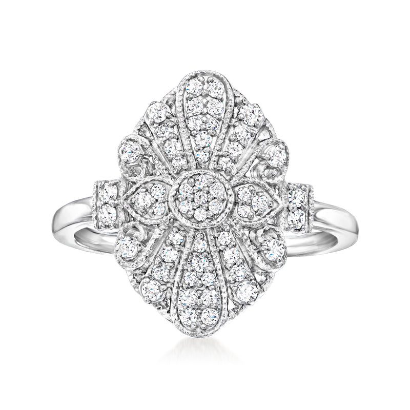 Vintage-style diamond ring in sterling silver with round center and halo of stones