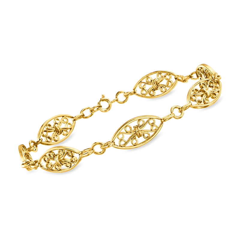 Vintage 18kt yellow gold scroll-link bracelet with oval filigree links and clasp