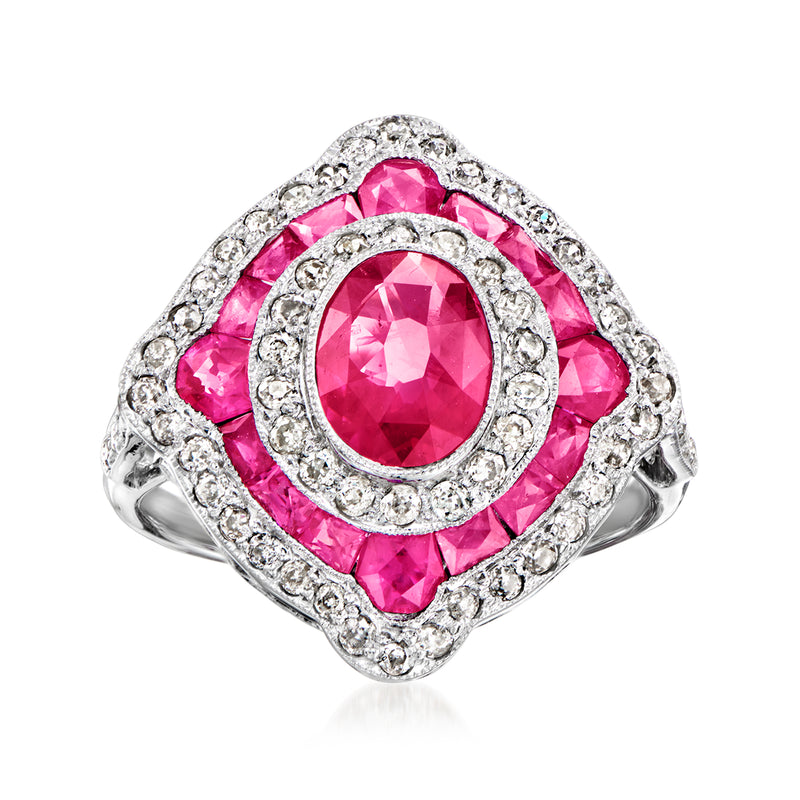 18kt white gold vintage ring with oval pink ruby center, diamond halo and side stones