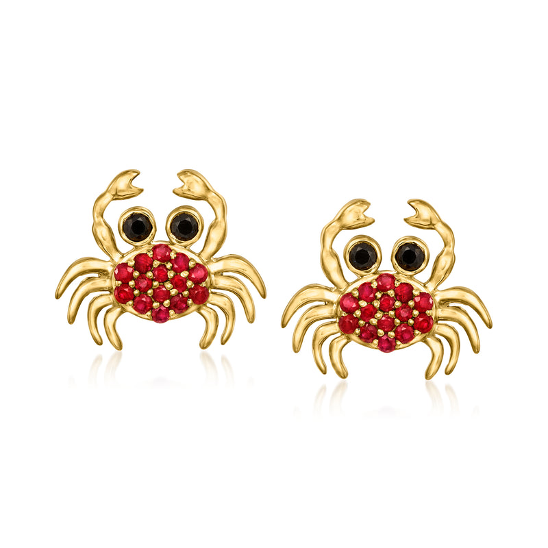 Gold crab post earrings with red round stones and black gem eyes