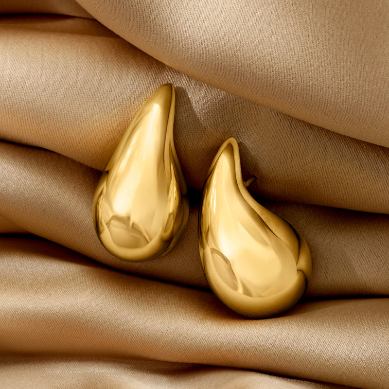 Gold over sterling teardrop earrings with domed teardrop shape detail