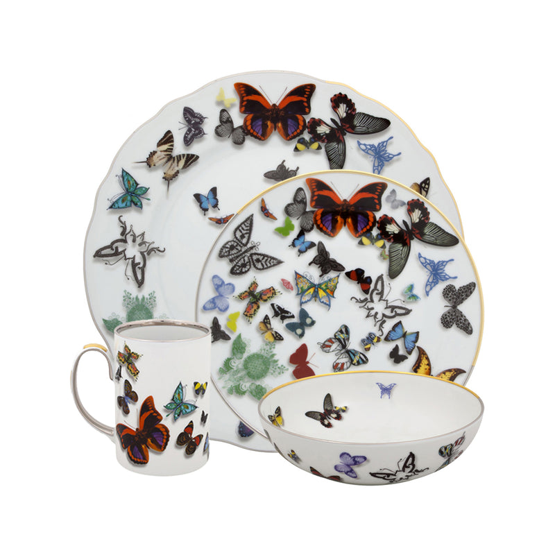 Vista Alegre Butterfly Parade 4-piece place setting with butterfly-pattern plate, bowl, and cup