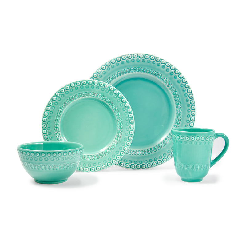 Aqua-green ceramic dinnerware set with scalloped beaded rims, including plates, bowl and mug