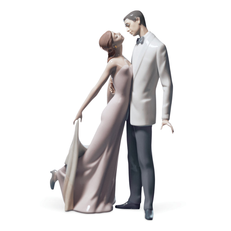 Lladro porcelain figurine of a couple: man in white jacket, woman in long dress