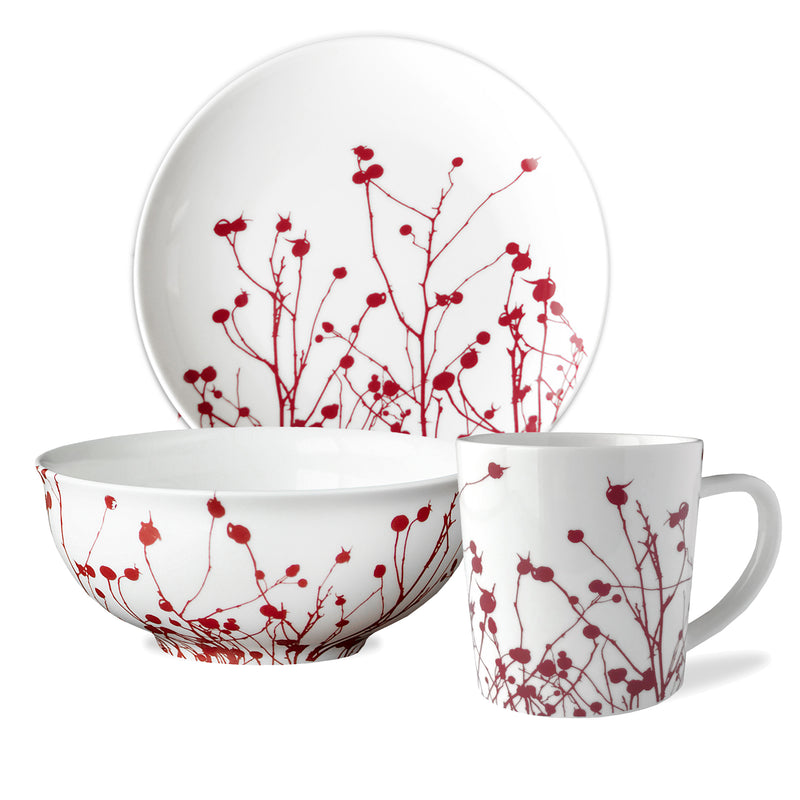 White porcelain bowl and mug with red berry branch pattern
