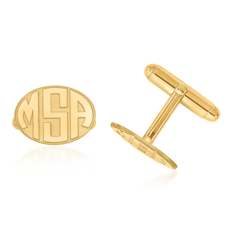 Yellow gold oval monogram cuff links with raised laser-cut letters