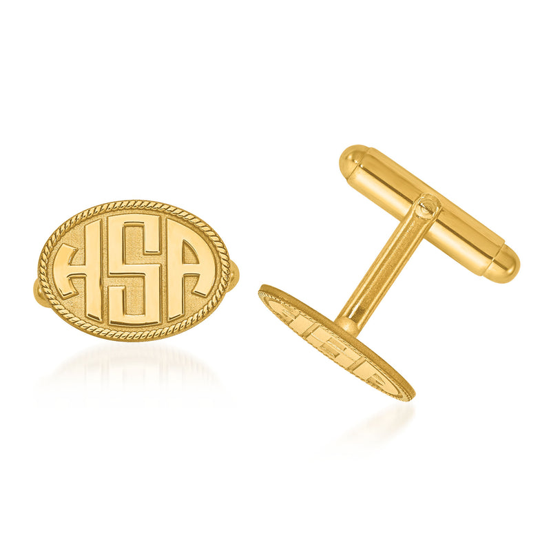 14kt yellow gold oval monogram cuff links with raised letters and border detailing