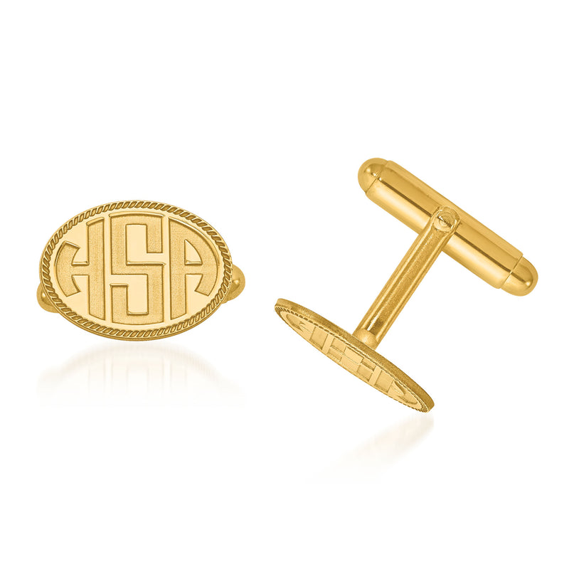 Yellow gold oval monogram cuff links with laser-recessed letters and border
