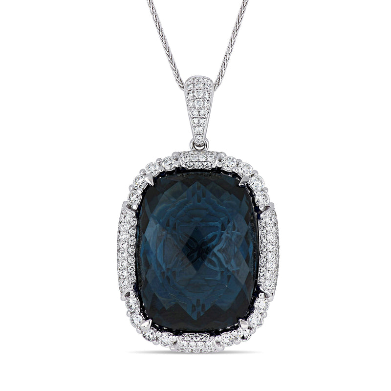 14kt white gold pendant necklace with large dark blue topaz and diamond halo