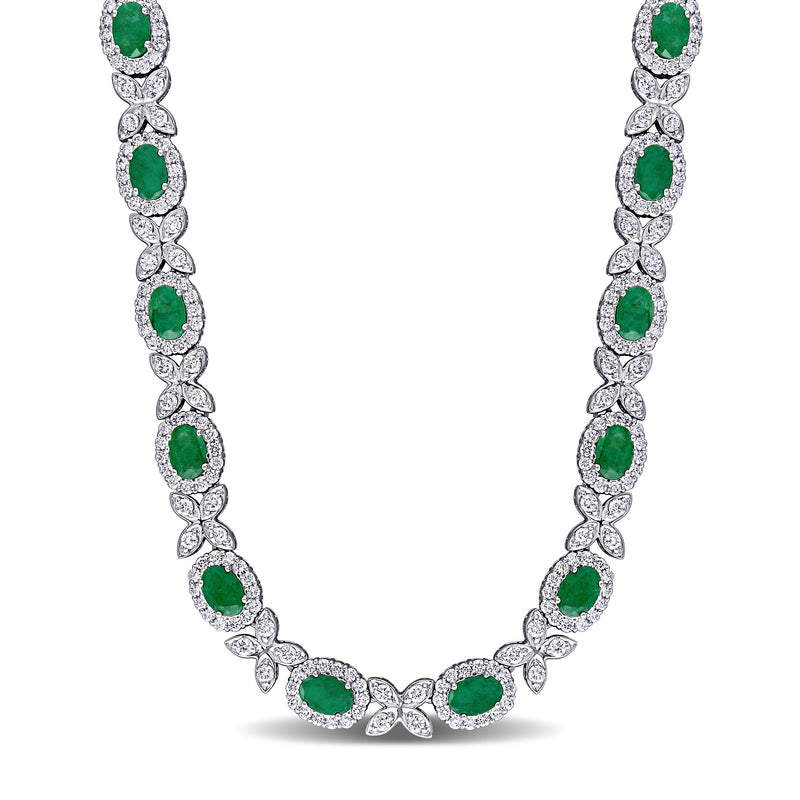 18kt white gold necklace with oval green emerald drops and diamond flower accents
