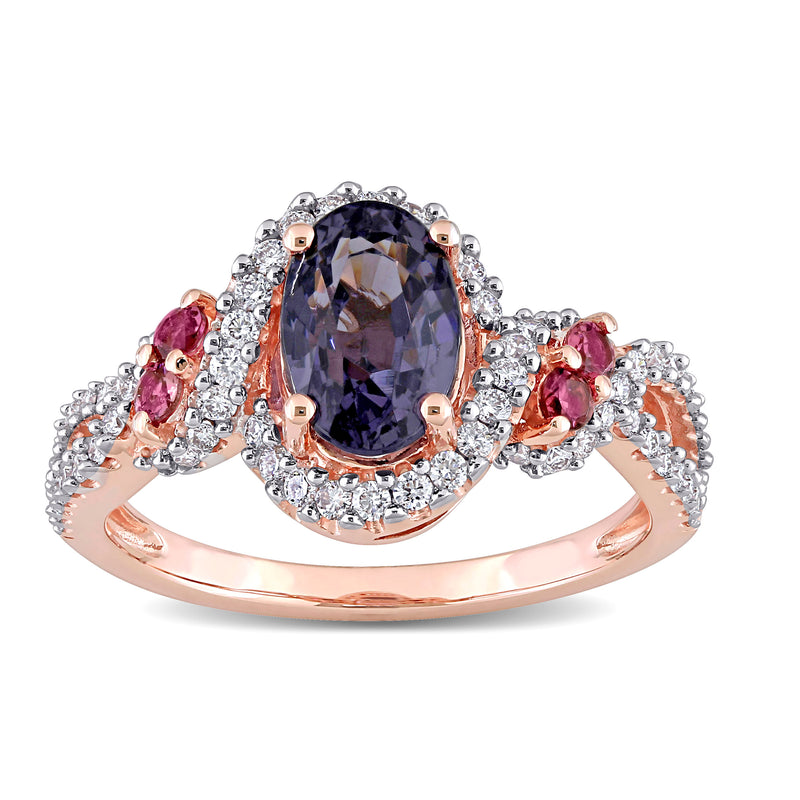 Oval purple spinel ring in 14kt rose gold with diamond halo and pink tourmaline accents