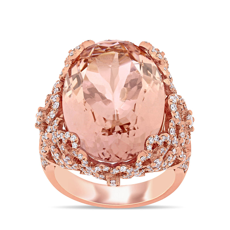 14kt rose gold cocktail ring with large morganite oval center and diamond halo