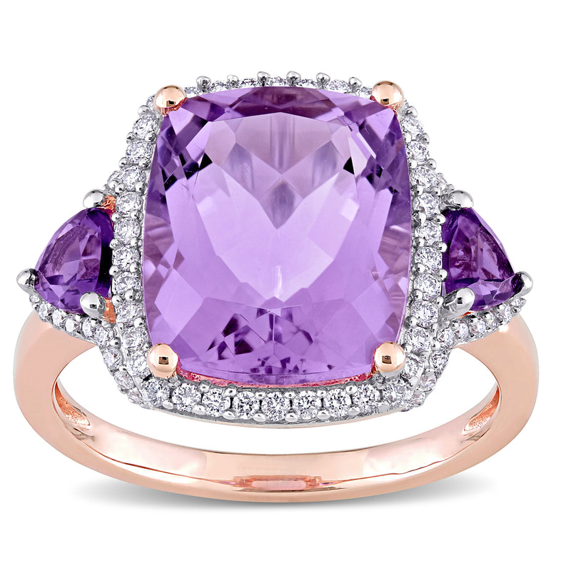 Oval amethyst and diamond halo ring in 14kt rose gold, with purple center stone