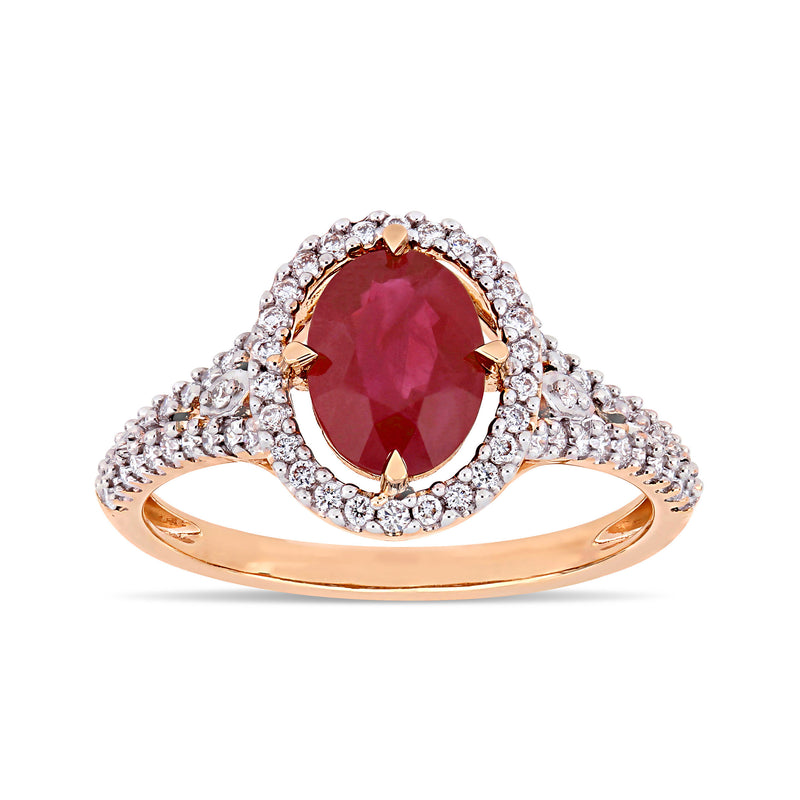 Ruby and diamond ring in rose gold with oval center stone and halo
