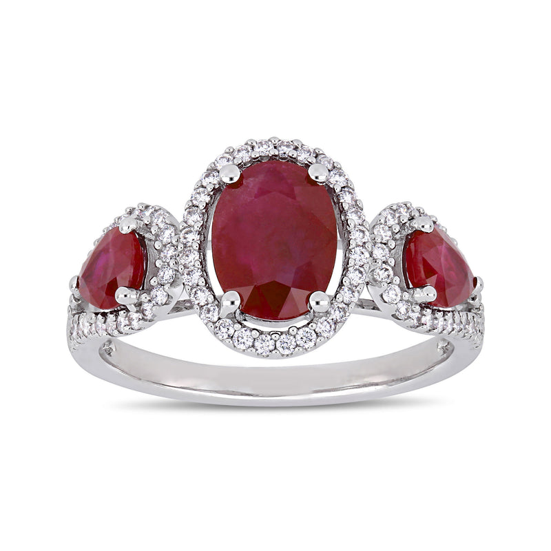 14kt white gold three-stone ring with oval ruby center and diamond halo