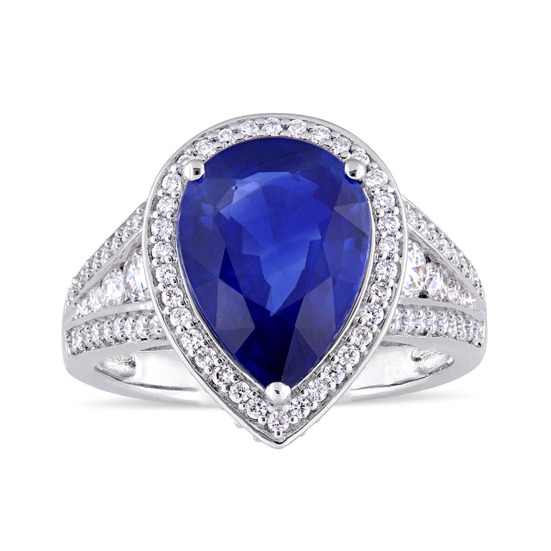 Pear-shaped sapphire and diamond halo ring in white gold