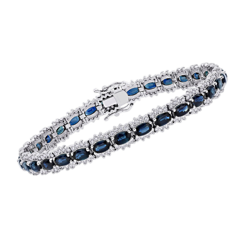 14kt white gold tennis bracelet with blue sapphire and diamond accents