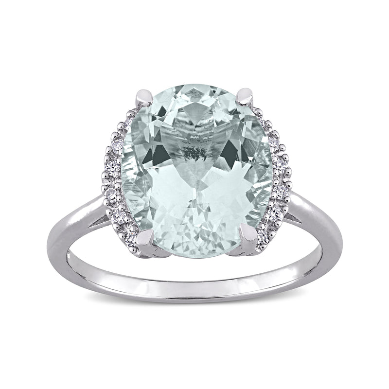 Sterling silver oval aquamarine center ring with round diamond accents halo