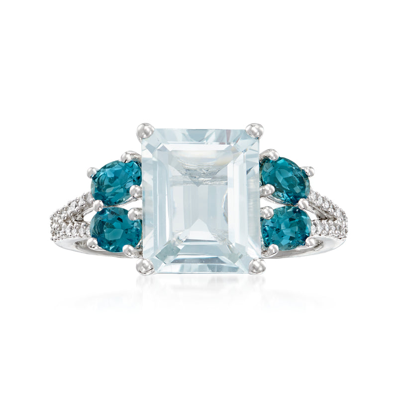 Sterling silver ring with rectangular light-blue center stone and round blue side stones