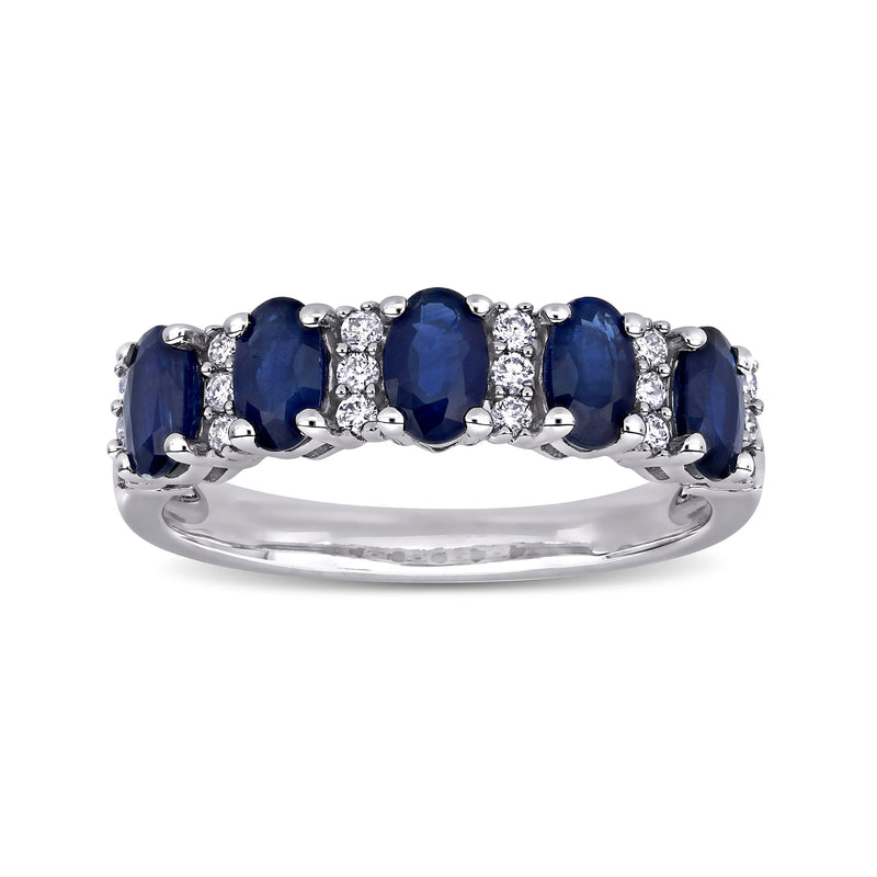 Sapphire and diamond ring in 14kt white gold with oval blue sapphires and small round diamonds