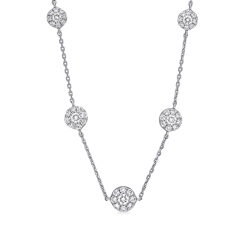 18kt white gold station necklace with five round diamond clusters on a linked chain