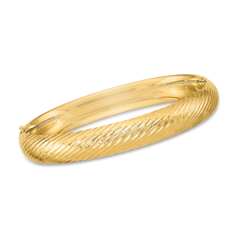 14kt yellow gold textured bangle bracelet with ribbed, linear pattern and hinged oval shape