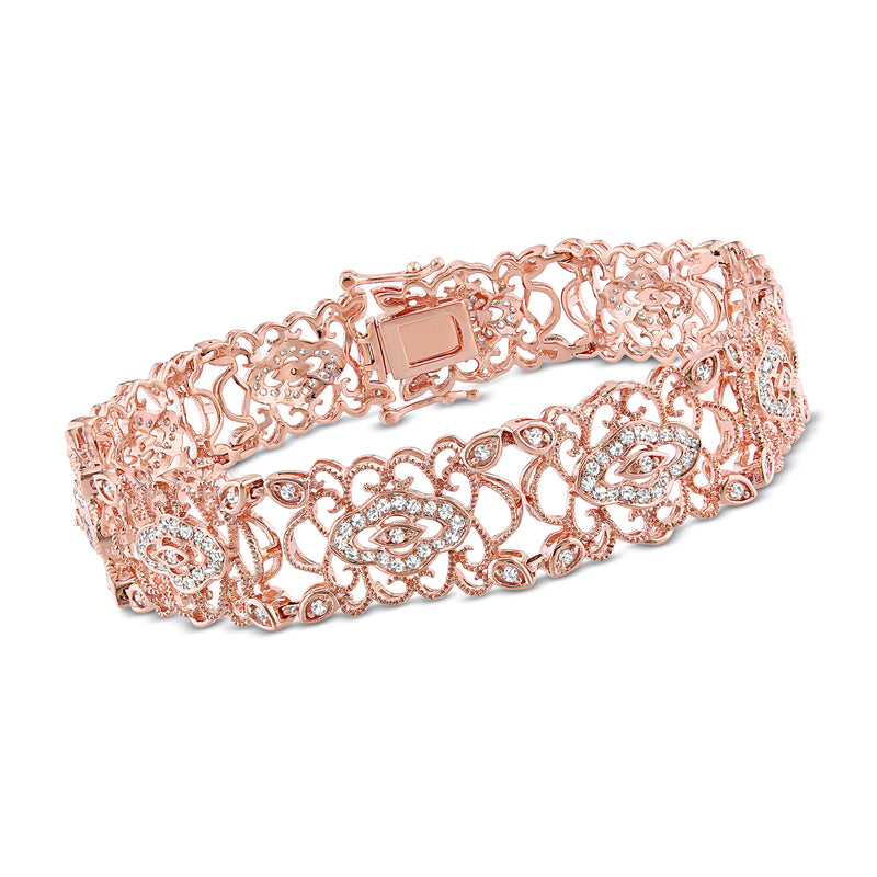 Rose gold openwork diamond bracelet with ornate floral filigree and square center link