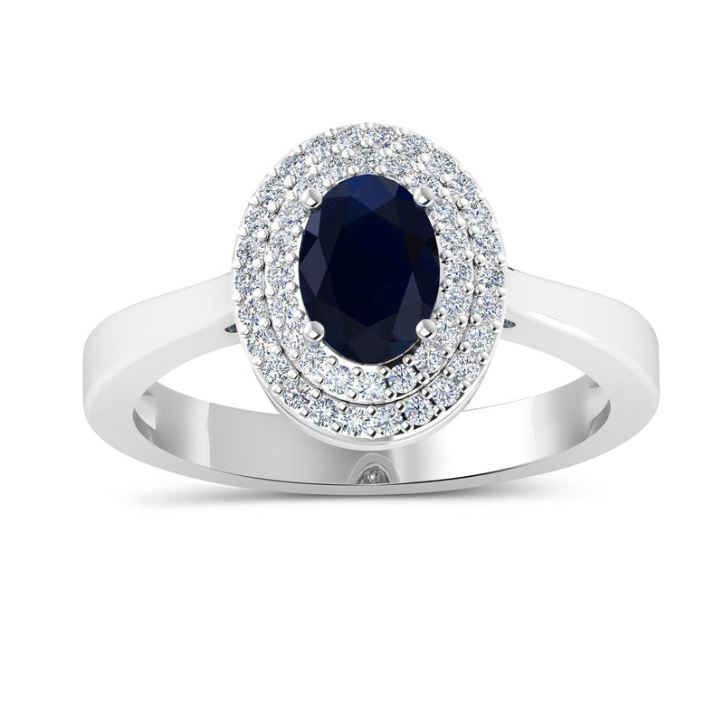 14k white gold ring with oval dark blue sapphire haloed by diamonds