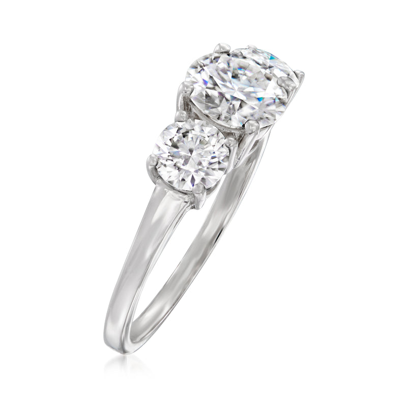 Sterling silver three-stone moissanite ring, side view with prong-set round stones