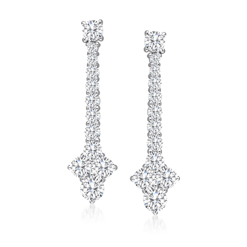 Sterling silver moissanite drop earrings with round stones and teardrop accents.