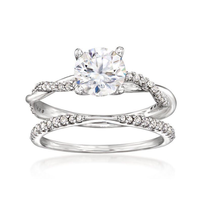 Sterling silver bridal ring set with round moissanite center and pave diamond bands