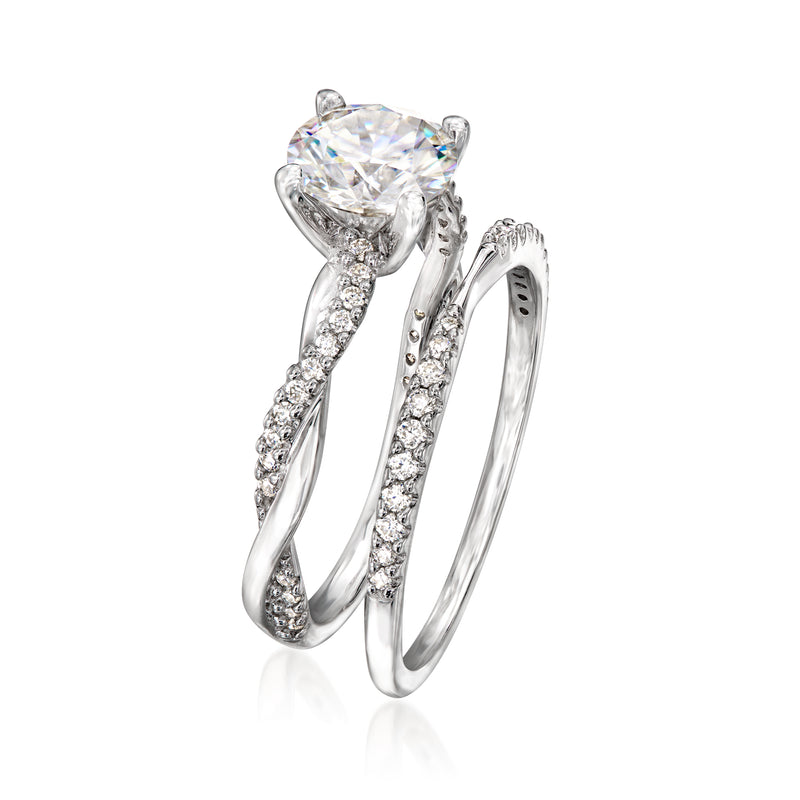 Sterling silver moissanite engagement ring with round center stone and pave band, side view
