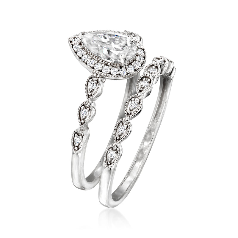 Moissanite bridal set with pear-cut center stone and pavé sterling silver bands