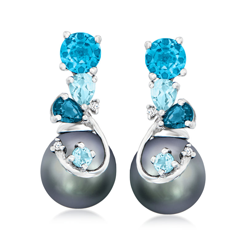 14kt white gold earrings with blue topaz drops and small diamond accents