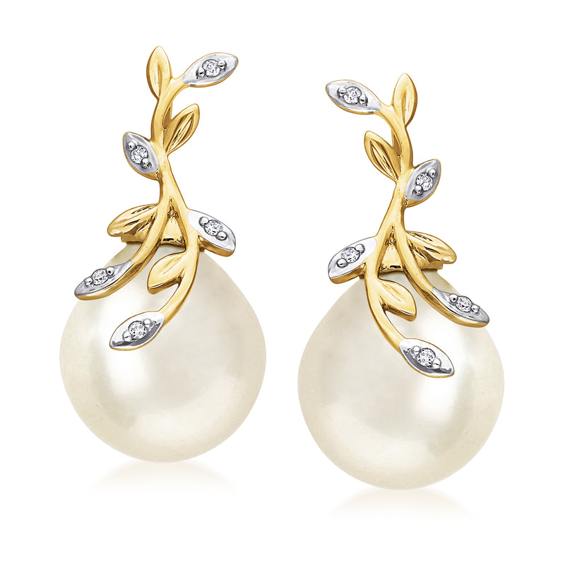 South Sea pearl earrings with diamond leaf details in 14kt yellow gold