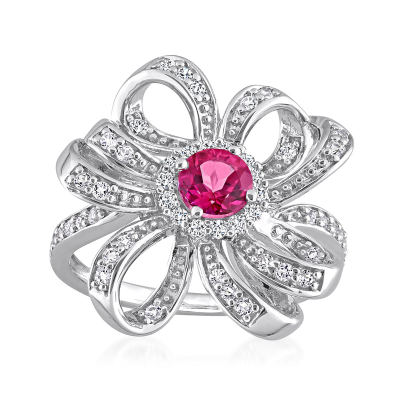 Sterling silver flower ring with bright pink round gemstone and clear stone petals