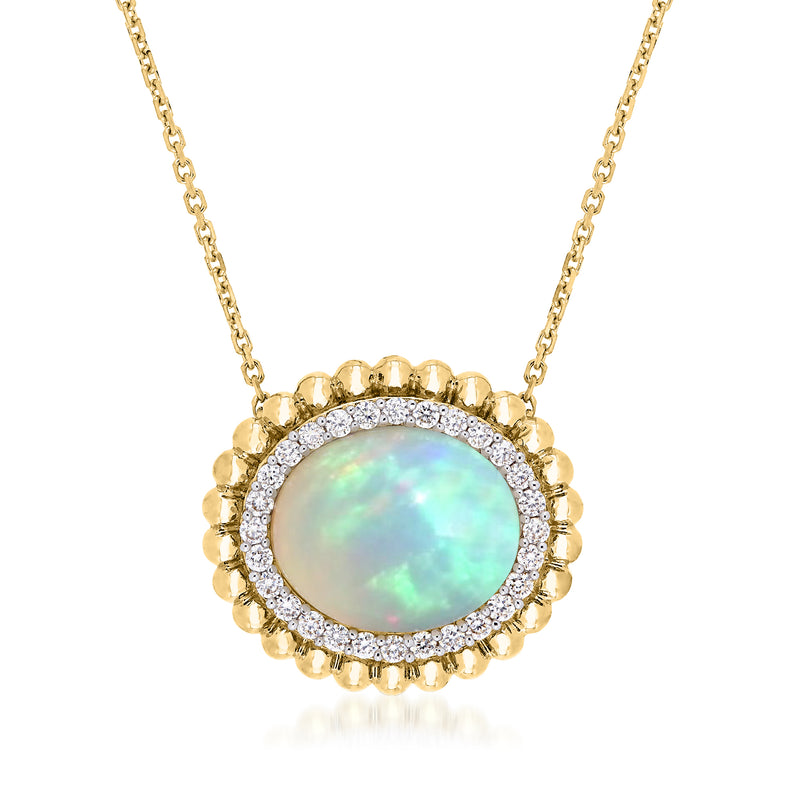 Yellow gold opal pendant necklace with diamond halo and round bezel, chain included