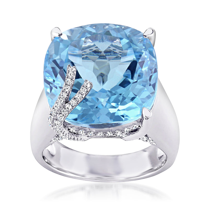 Sky blue topaz and diamond halo ring in 14kt white gold, openwork band